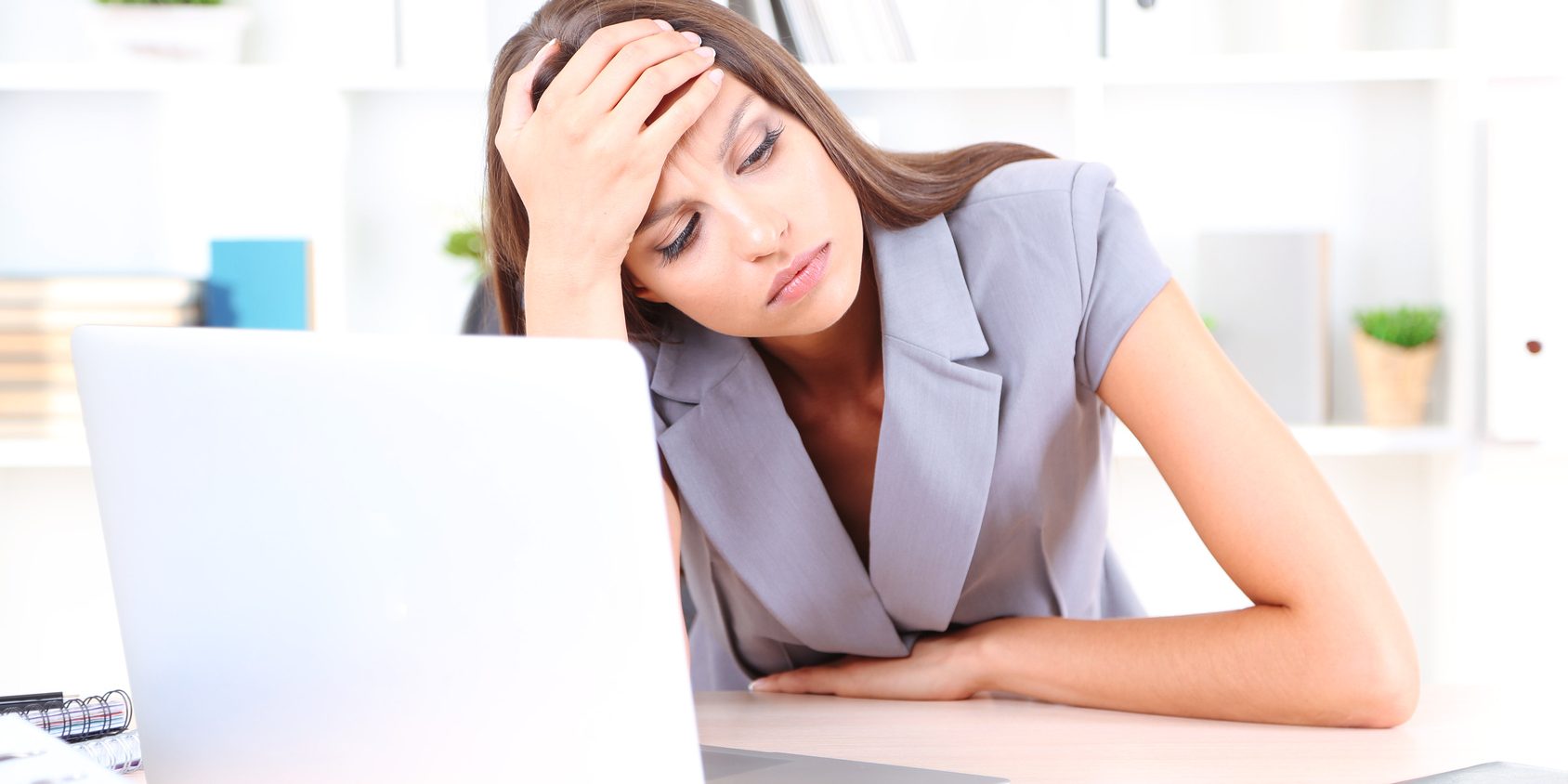 Young business woman in office