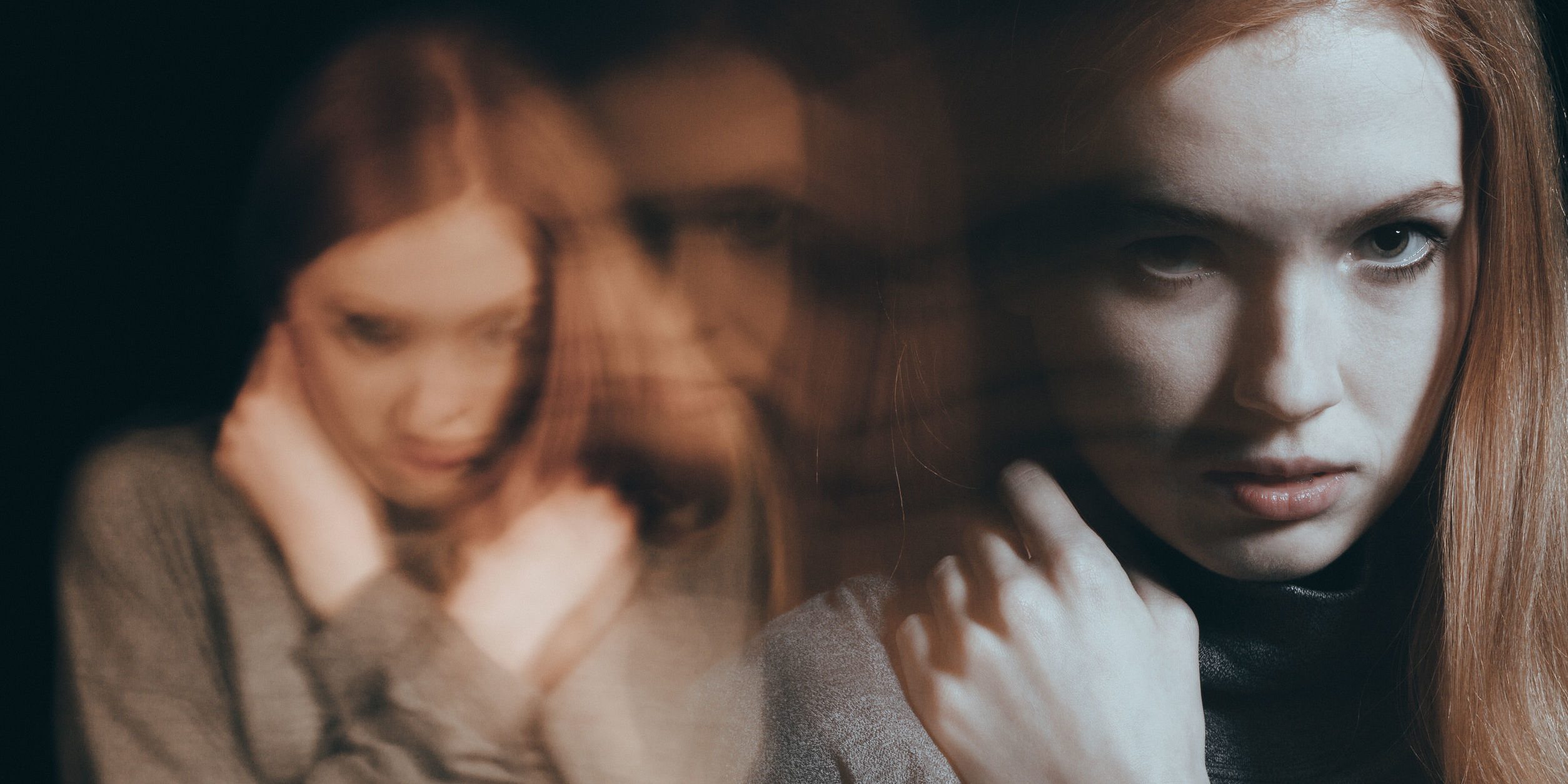 82814507 – angry teenage girl holding her hand close to her face